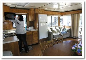 kitchen and living area of Patoka Queen houseboat
